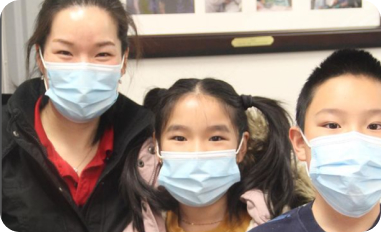 kids and Mom with masks